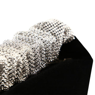 Diamond-studded velvet evening bag.