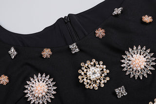 BROOCH-EMBELLISHED SCOOPNECK GOWN IN BLACK